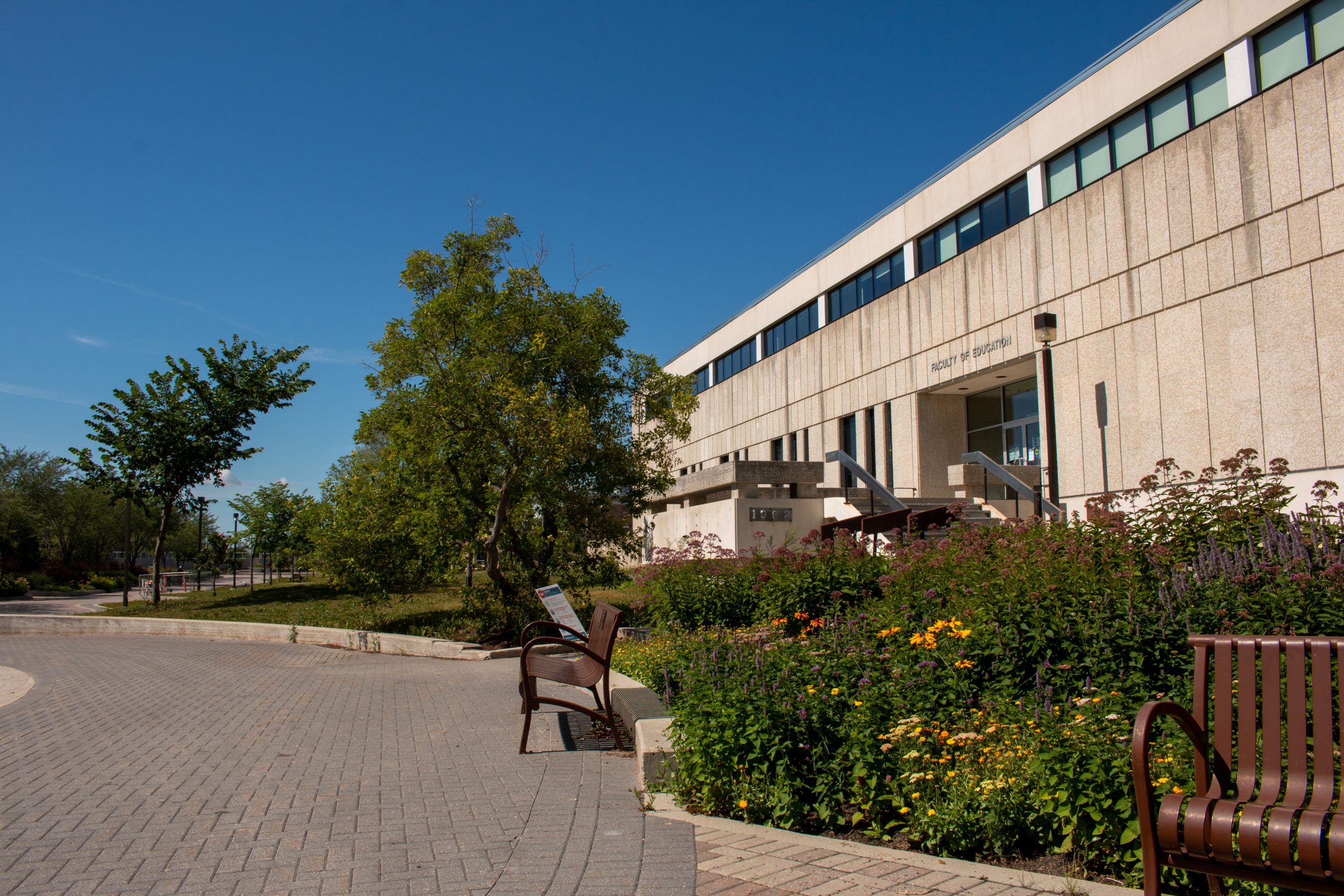 Photo of west entrance of Robson Hall at 224 Dysart road with landscape detail
