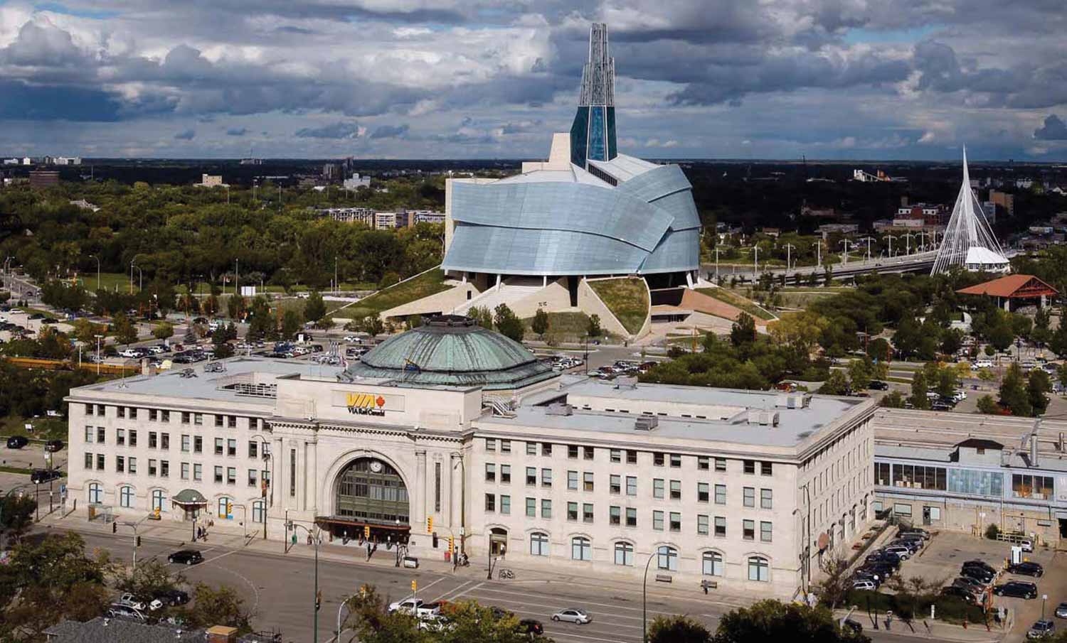 A photo of the exterior of Union Station in 2015. The Canadian Museum for Human Rights and Esplanade Riel are in the background.