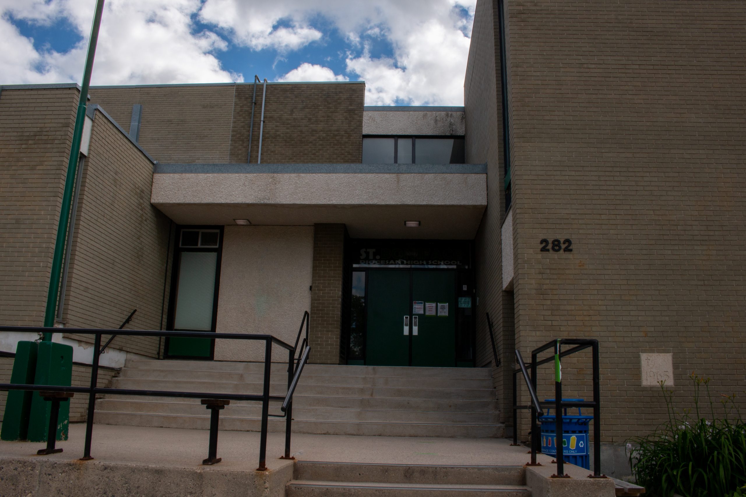 Detail photo of entryway to St. Boniface Diocesean High School at 282 Dubuc Street