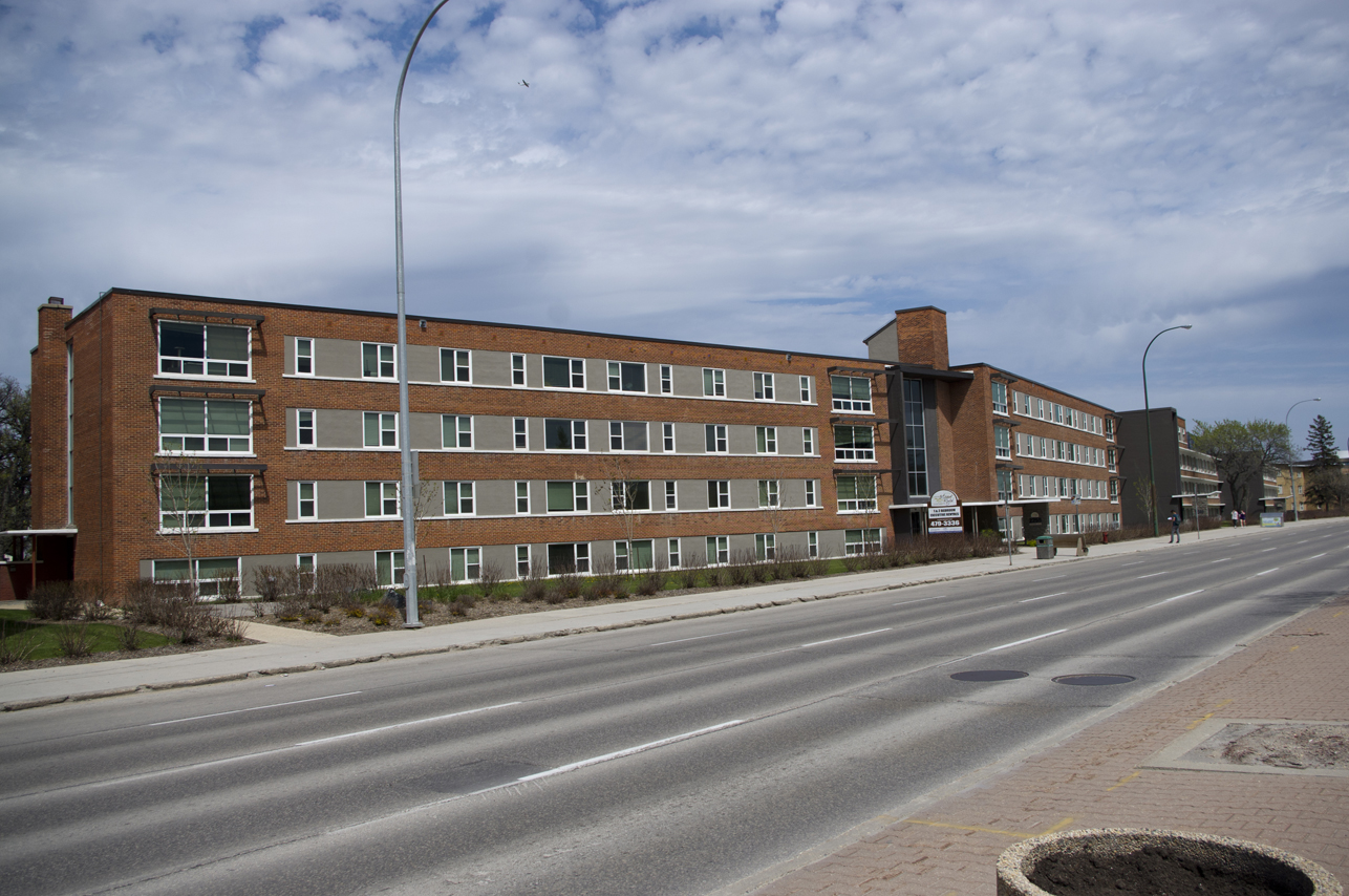 Image shows the exterior of the apartment from the distance.